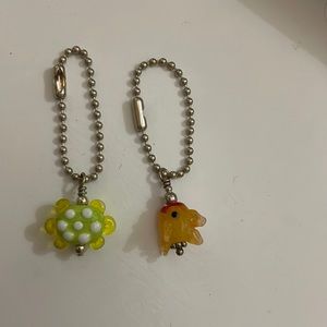 Cute little glass charms. 🌸 & 🐠
